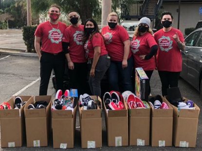 Journeys employees from Los Angeles-area collect & donate items to a local boys home